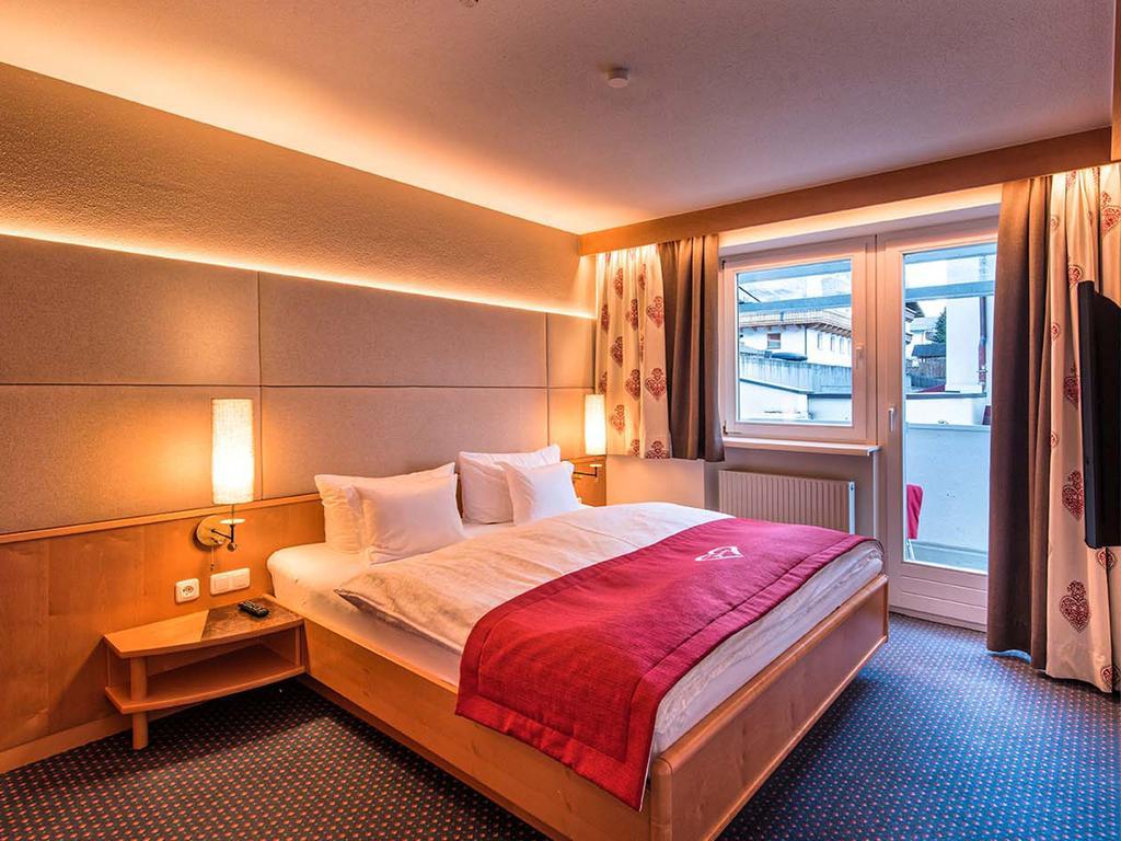 Hotel Universo Serfaus Pokoj fotografie