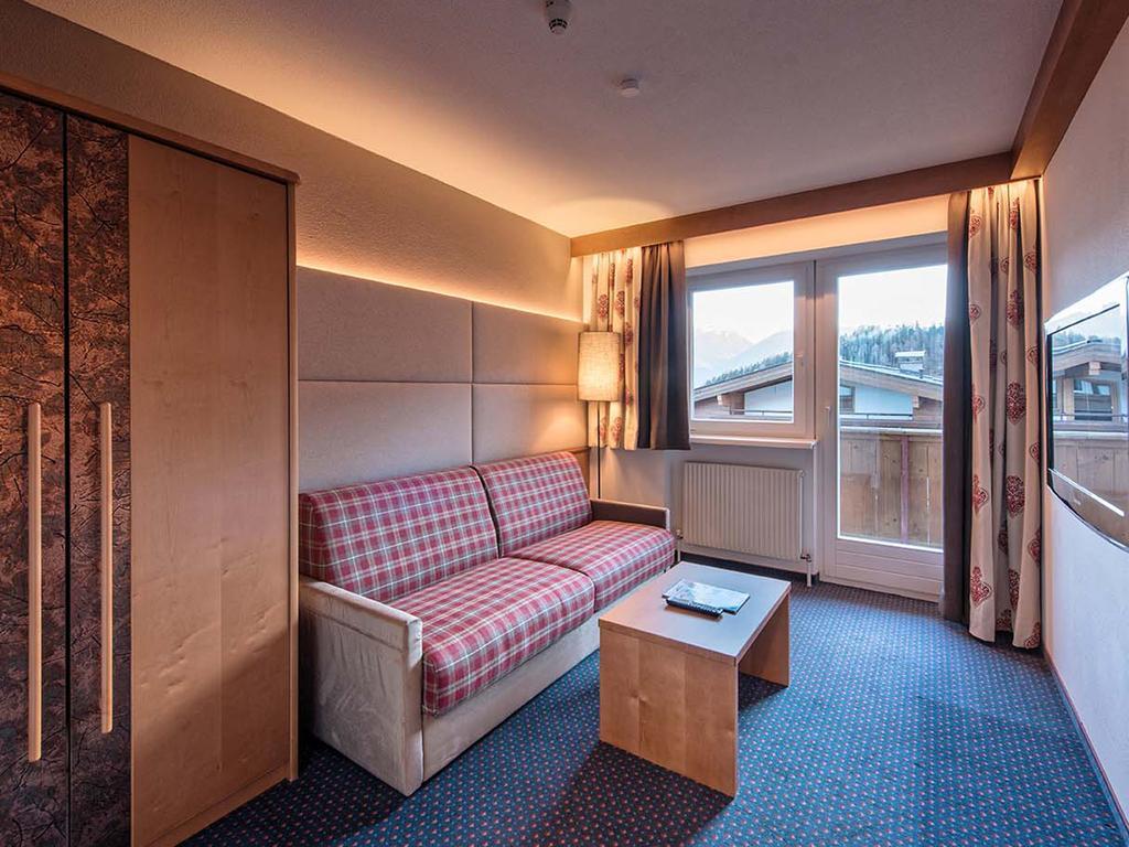 Hotel Universo Serfaus Pokoj fotografie